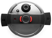 Draufsicht auf den Deckel eines Schnellkochtopfs mit schwarzem Griff und rotem Verschlussmechanismus.