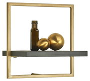 Wandregal mit goldfarbenem Rahmen und grauer Ablage, darauf eine braune Flasche und zwei goldene Kugeln, seitliche Perspektive