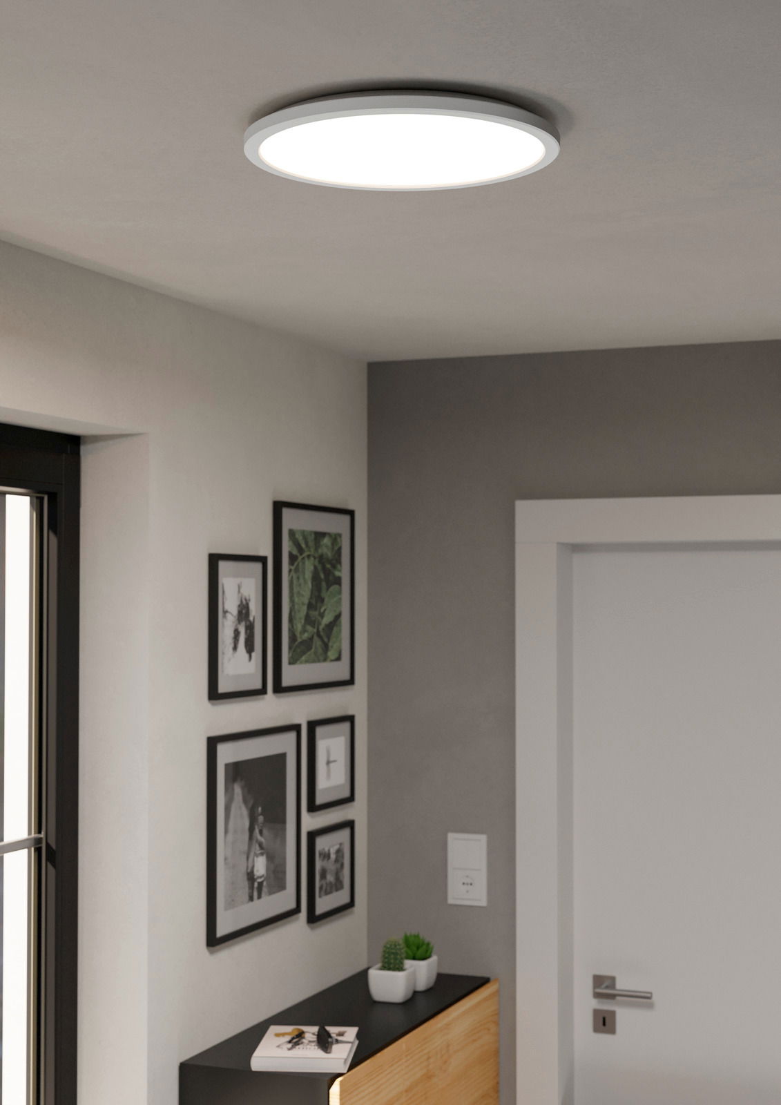 Moderne LED-Deckenleuchte ROVITO-Z in einem stilvollen Raum, von unten betrachtet.