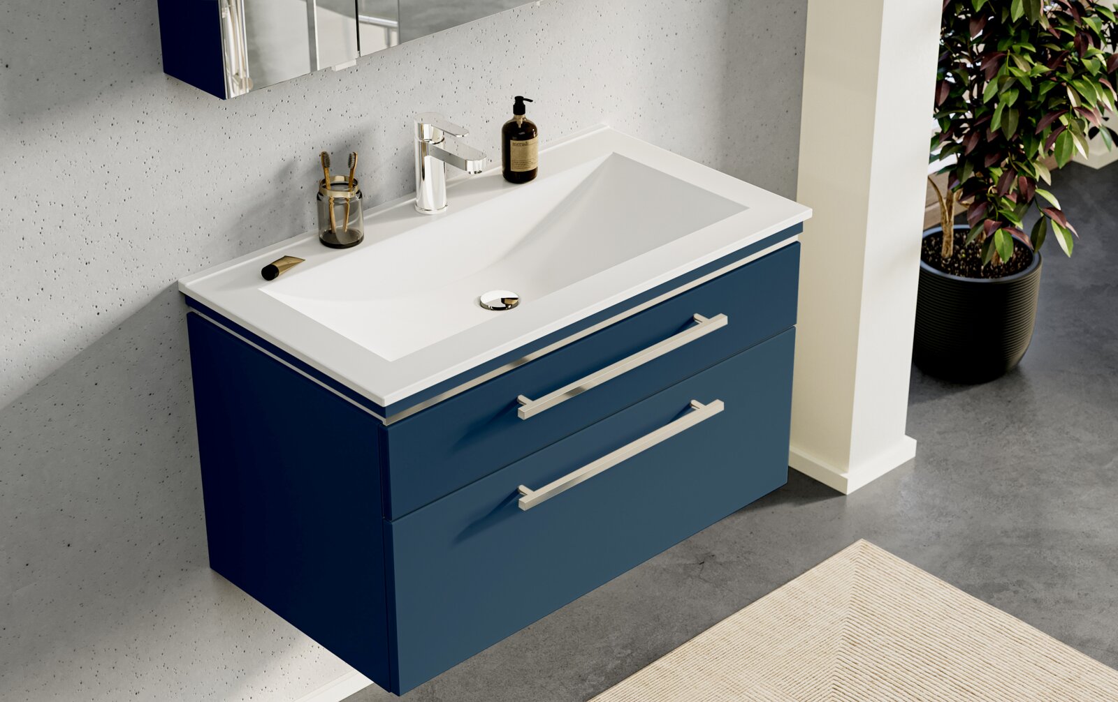 Modernes Badmöbel-Waschbecken-Set mit blauem Unterschrank und weißem Waschtisch, Chrom-Armatur und zwei Schubladen, fotografiert aus leicht erhöhter schräger Vorderansicht