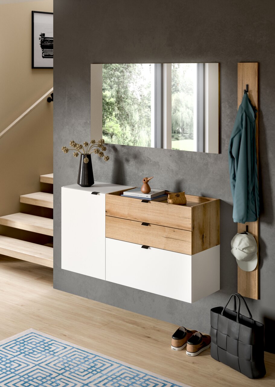 MID.YOU Hängekommode NARO Modernes, schwebendes Flur-Sideboard in Weiß und Eiche mit zwei Schubladen und Klapptür unter einem Wandspiegel, frontale Perspektive im Eingangsbereich