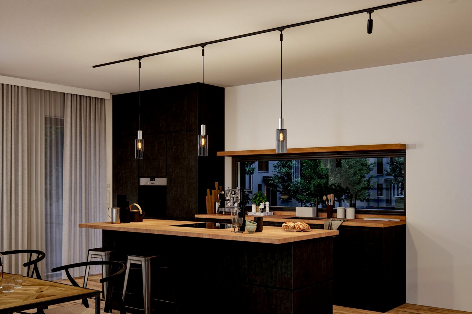 Moderne keuken met drie hangende Raja-decoratieve lampen in een elegante, donkere omgeving, gezien vanaf de zijkant.