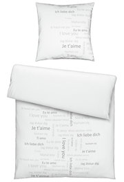 Bettwäsche-Set mit Kissenbezug und Deckenbezug, bedruckt mit 'Ich liebe dich' in verschiedenen Sprachen, von oben betrachtet.