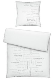Bettwäsche-Set mit Kissenbezug und Deckenbezug, bedruckt mit 'Ich liebe dich' in verschiedenen Sprachen, von oben betrachtet.