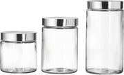 Drei runde Glasdosen mit silbernen Deckeln in verschiedenen Größen, frontal betrachtet.