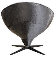 Achterkant van een moderne fauteuil met zwarte stoffen bekleding en een stevig, stervormig metalen onderstel.