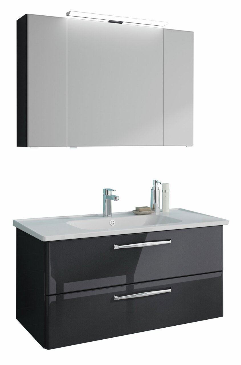 Moderner Badblock mit Spiegelschrank und Waschbecken, frontal betrachtet.