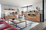 Moderne Wohnzimmermöbel in Holzoptik, bestehend aus Sideboard, TV-Aufsatz, Wohnwand und Couchtisch, aus der Perspektive eines gemütlichen Wohnzimmers.