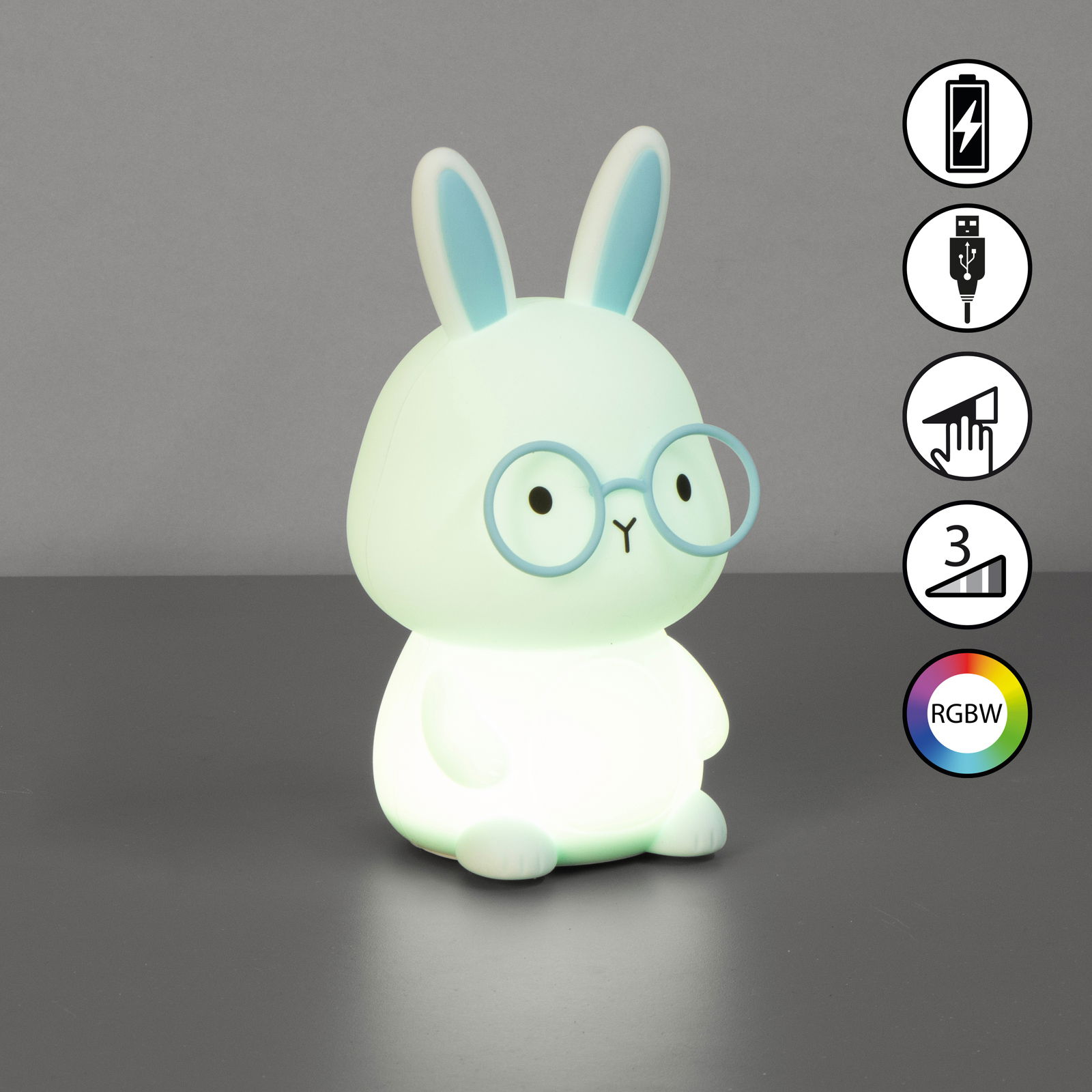 Niedliches Akku-Nachtlicht in Form eines Hasen mit Brille, seitliche Perspektive, leuchtet in verschiedenen Farben.