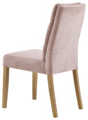 Rückansicht eines eleganten Stuhls mit rosa Polsterung und Holzbeinen, Modell Cantus Stuhl NAOMI.
