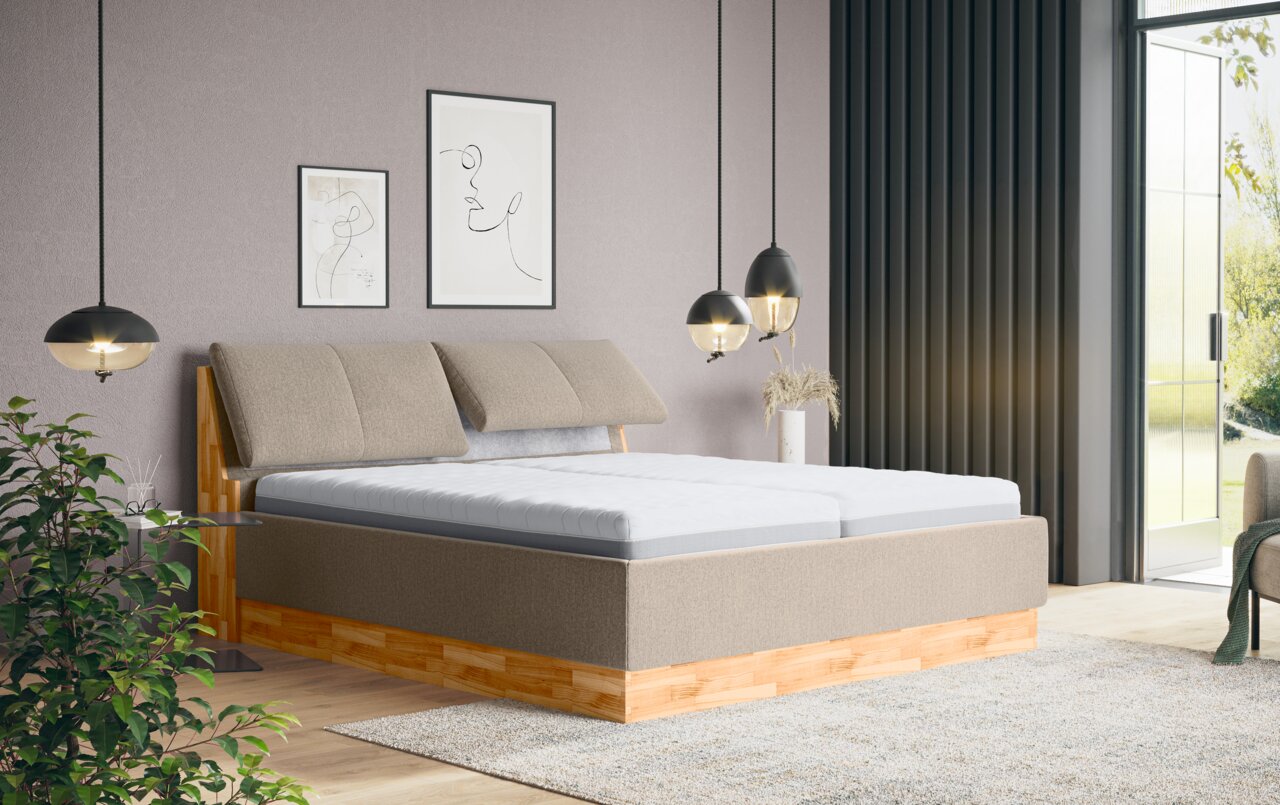 Modernes Polsterbett in einem stilvollen Schlafzimmer, seitliche Perspektive mit hölzernem Rahmen und bequemen Kopfstützen.