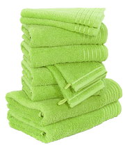 Stapel von leuchtend grünen Handtüchern, seitliche Perspektive