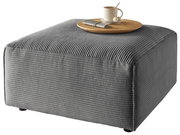 Grauer Hocker mit gerippter Oberfläche, darauf ein Tablett mit Tasse und Löffel, seitliche Perspektive