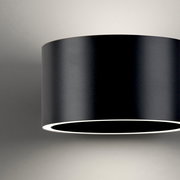 Schwarze, zylindrische Wandleuchte PURE CLIPSE von Paul Neuhaus, seitliche Perspektive