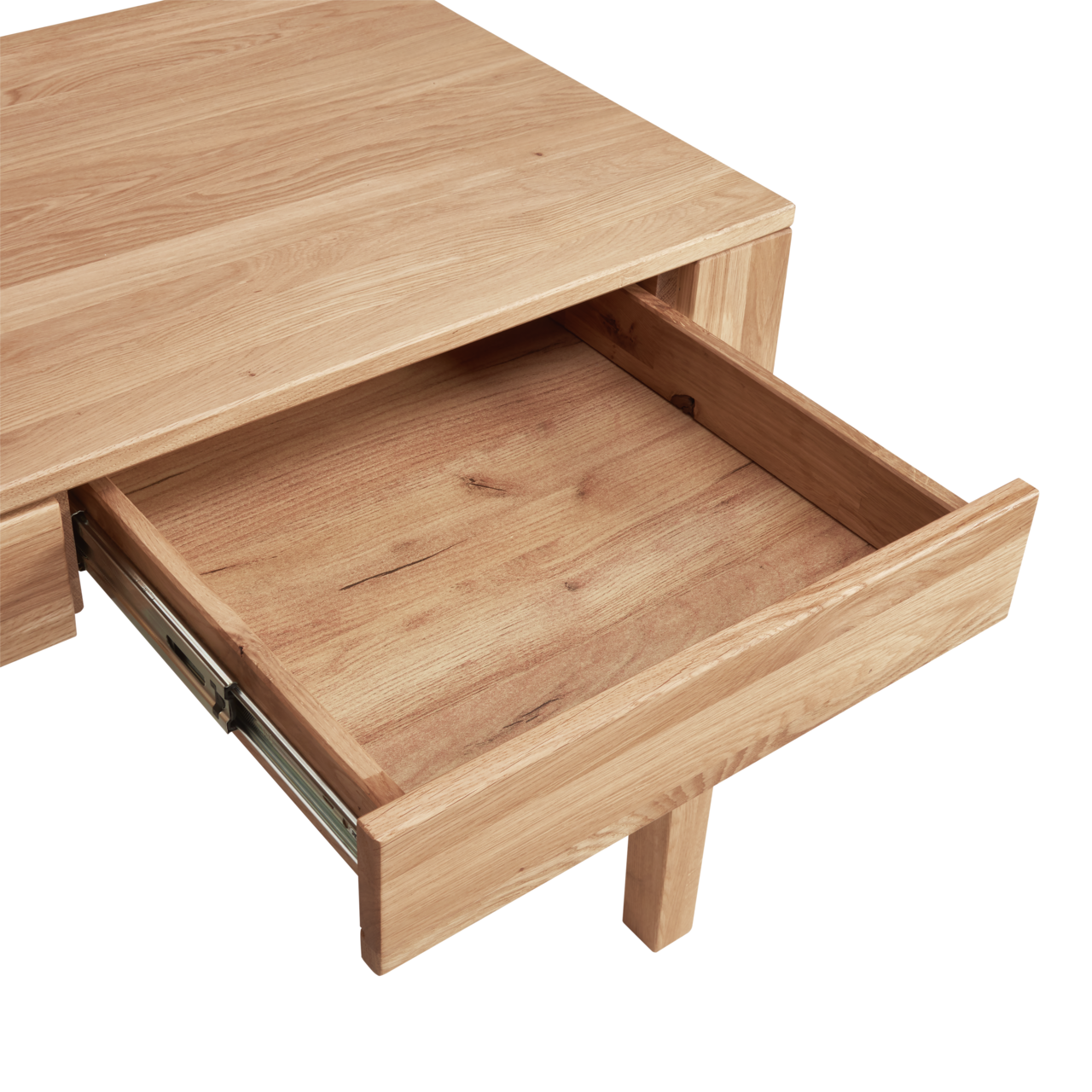 Nahaufnahme eines Schreibtisches aus Holz mit geöffneter Schublade, Perspektive von oben.