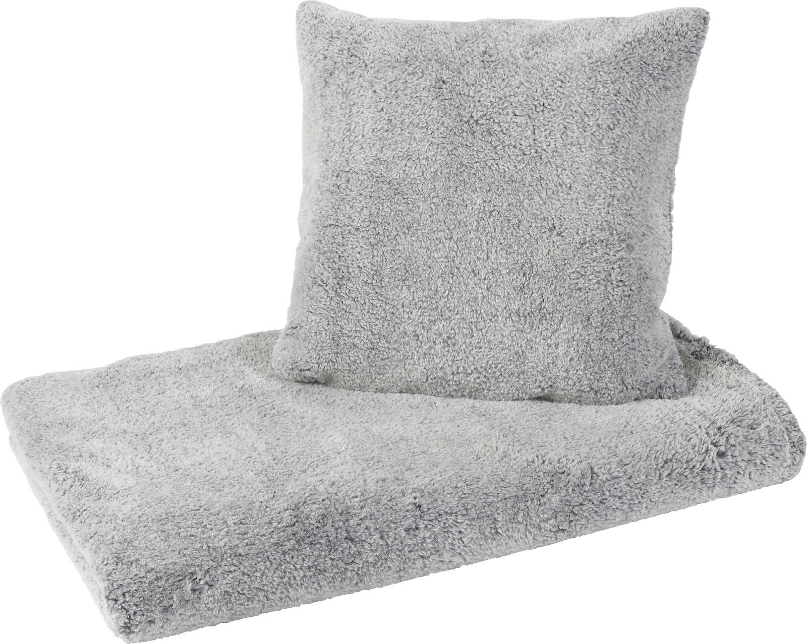 Graue Felldecke mit passendem Kissen, seitliche Perspektive