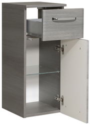 Moderner grauer Unterschrank mit einer offenen Schublade und einer geöffneten Tür, seitliche Perspektive