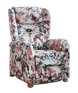 Blumig gemusterter Fernsehsessel Cantus FRIESLAND in Frontalansicht mit Holzfüßen.
