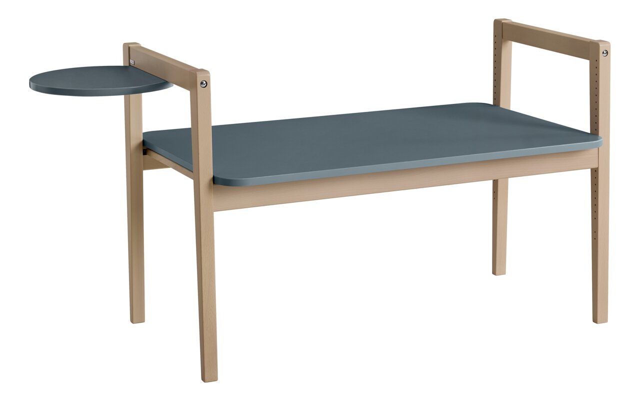 Zijaanzicht van een tafelblad met een klein, rond aanbouwdeel, geschikt voor de Tiny Table.