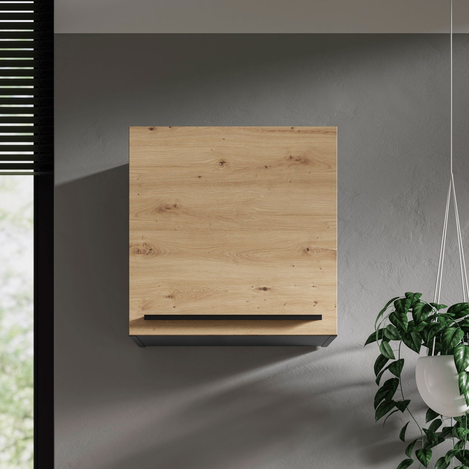 Moderner Hängeschrank aus Holz in Frontansicht, montiert an einer grauen Wand, mit einer Pflanze rechts im Bild.