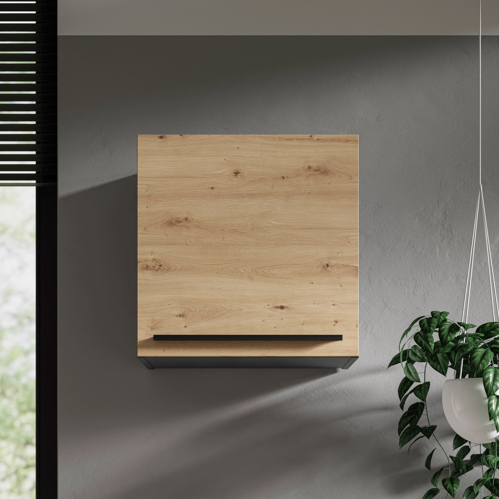 Moderner Hängeschrank aus Holz in Frontansicht, montiert an einer grauen Wand, mit einer Pflanze rechts im Bild.