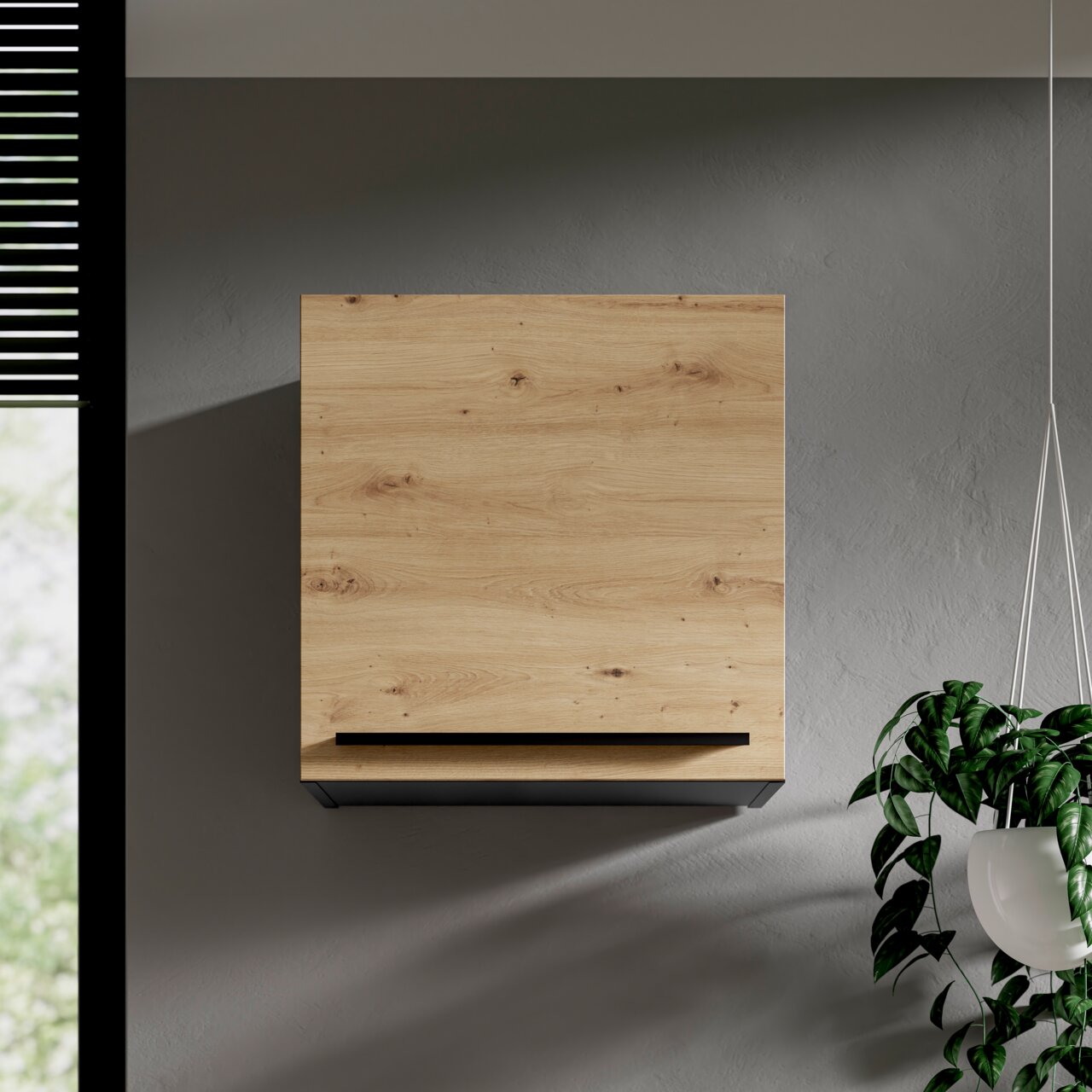 Moderner Hängeschrank aus Holz in Frontansicht, montiert an einer grauen Wand, mit einer Pflanze rechts im Bild.
