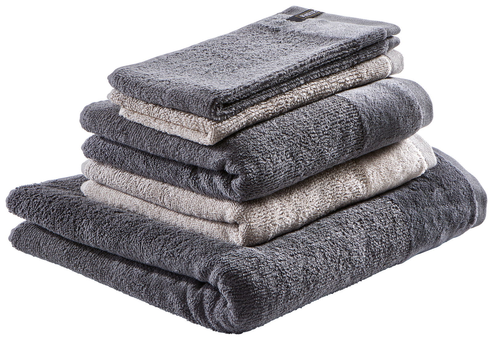 Stapel von grauen und beigen Handtüchern, seitliche Perspektive