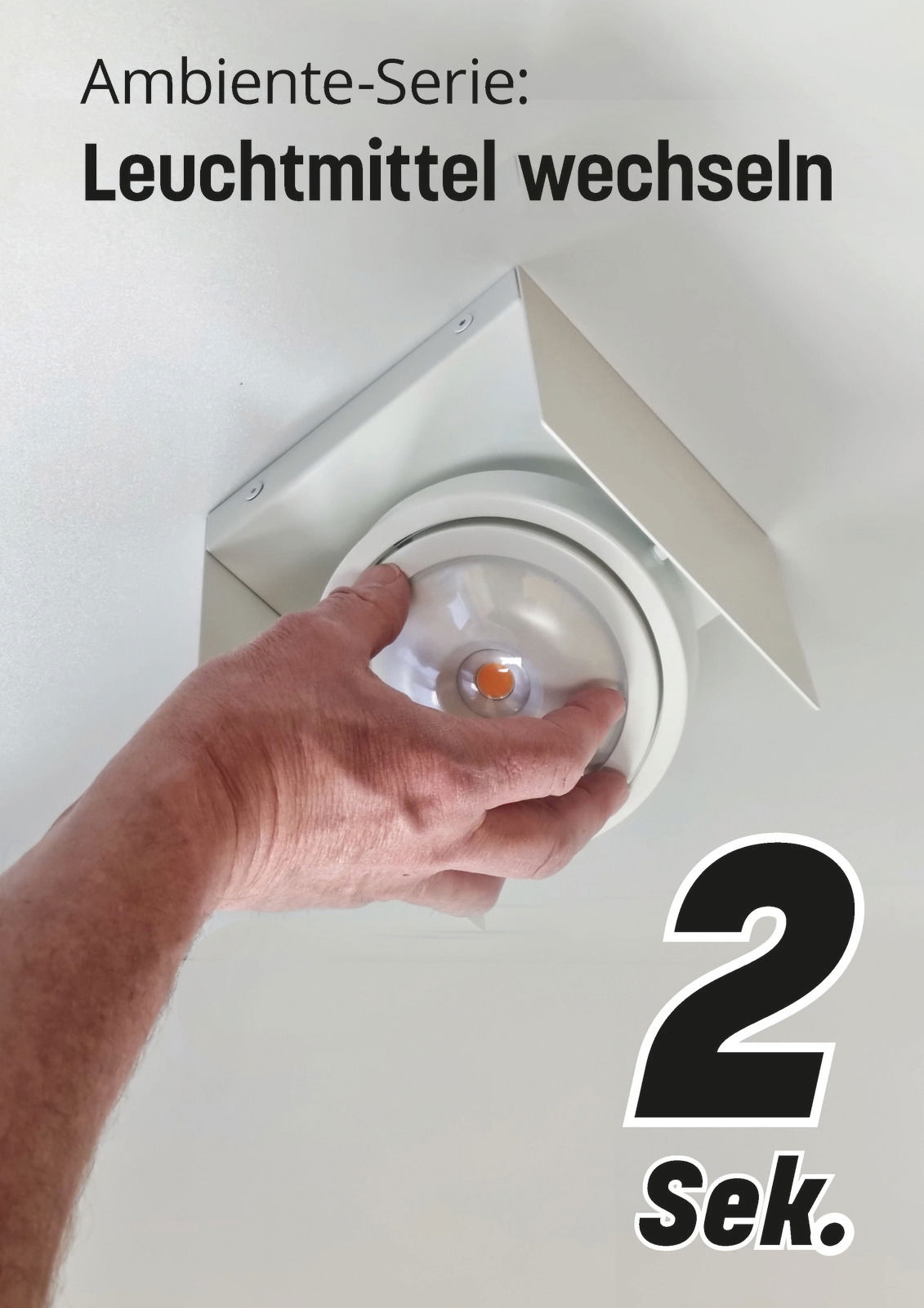 Hand wechselt Leuchtmittel in LED Aufbauleuchte, Perspektive von unten