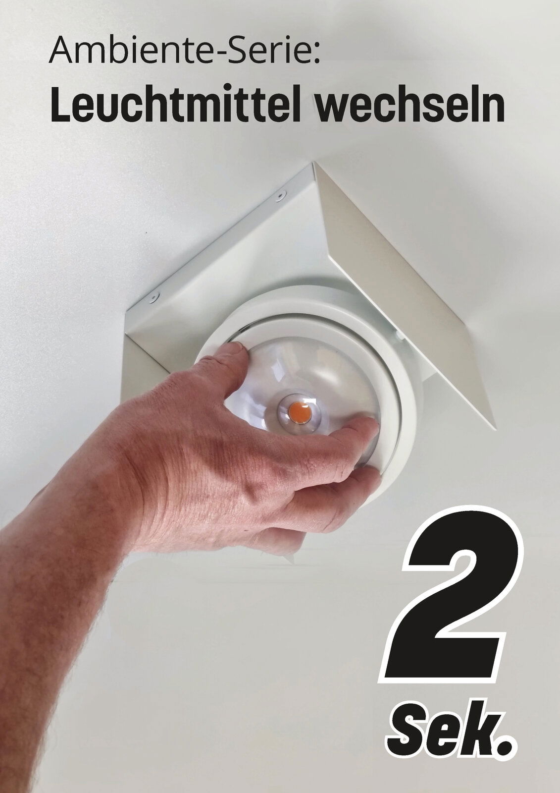 Hand wechselt Leuchtmittel in LED Aufbauleuchte, Perspektive von unten