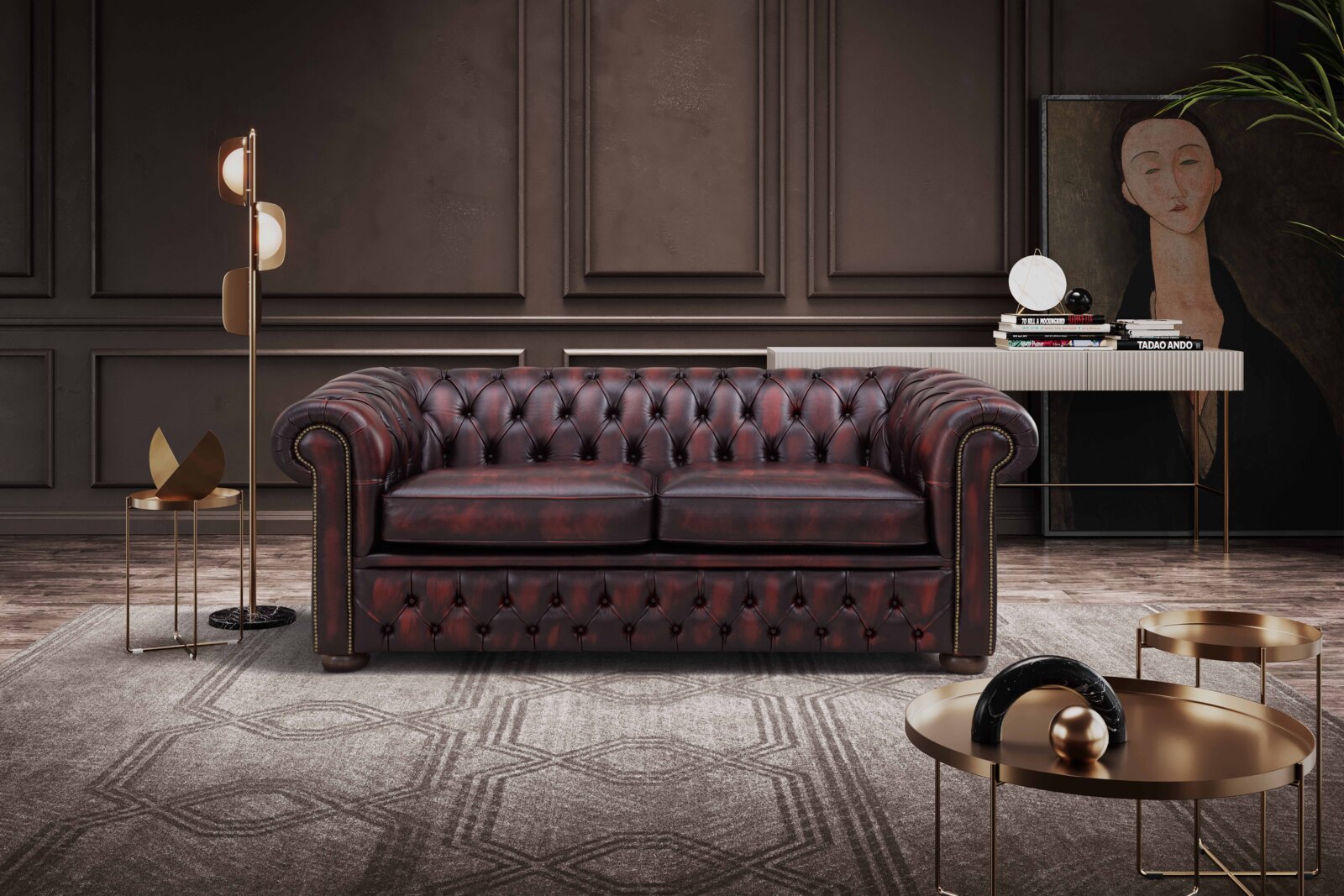 Chesterfield Sofa in einem eleganten Wohnzimmer, frontal betrachtet, mit dunklem Lederbezug und klassischem Design.