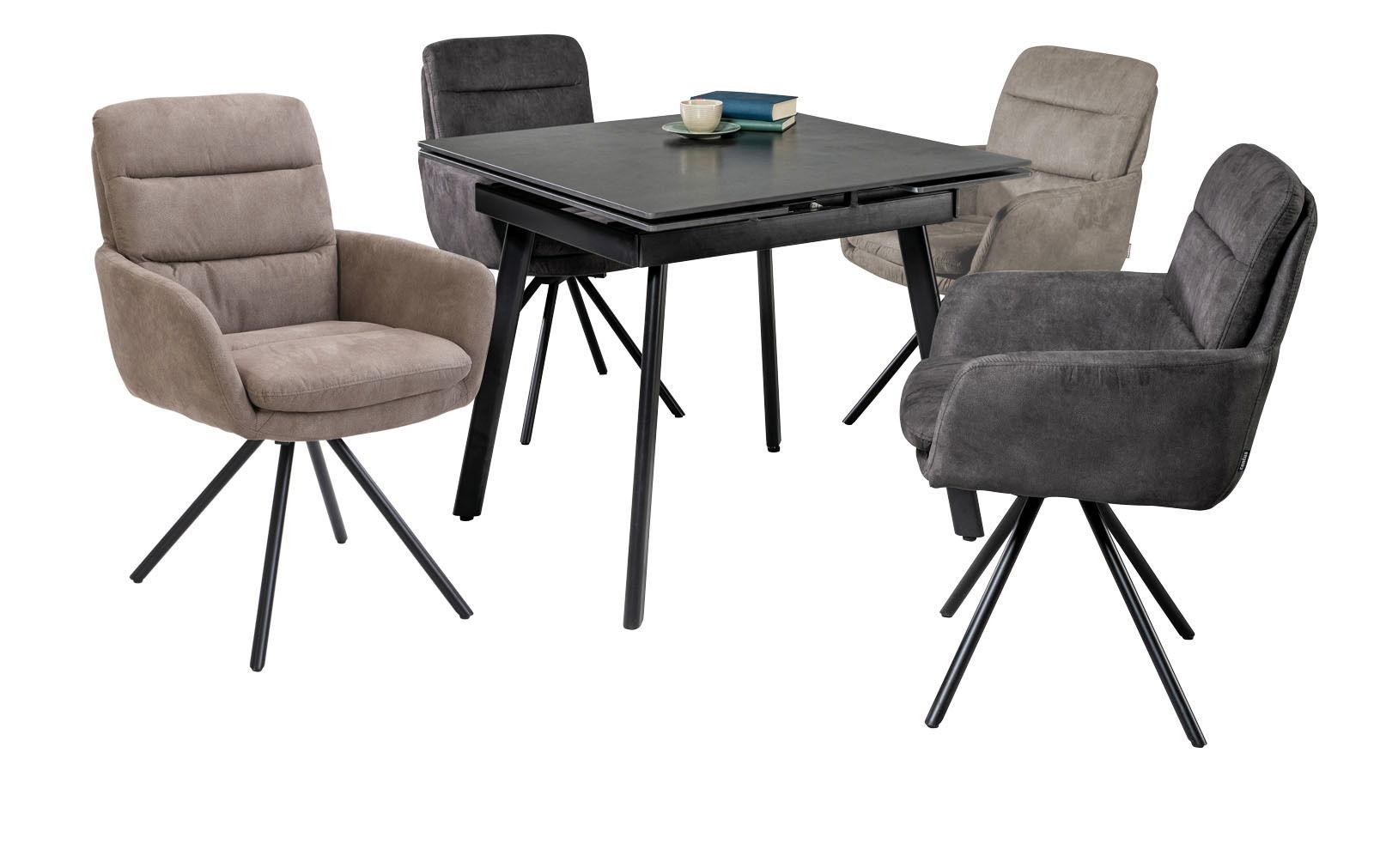 Moderner Esstisch mit vier gepolsterten Armlehnstühlen in verschiedenen Farben, seitliche Perspektive.