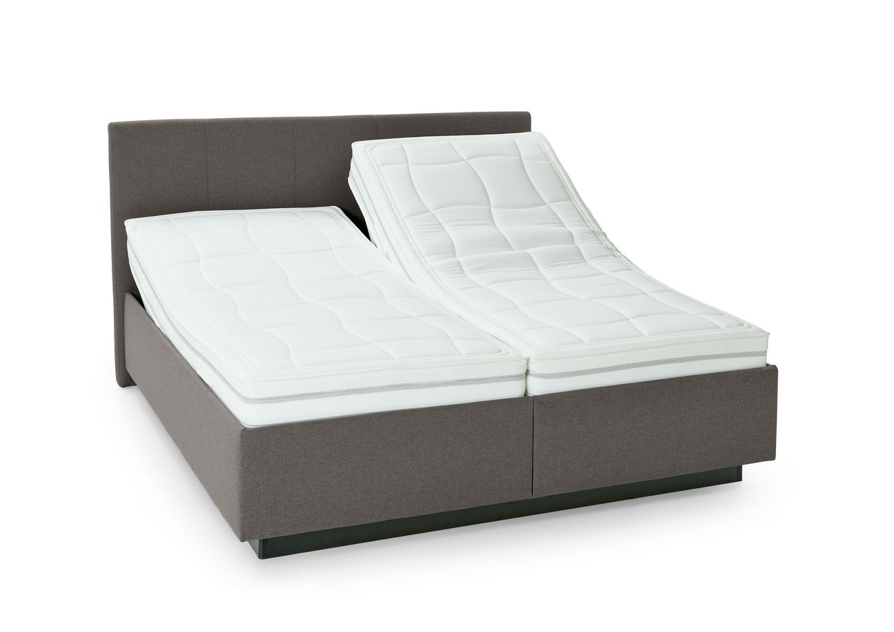Polsterbett mit verstellbaren Matratzen, seitliche Perspektive