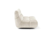 Zijaanzicht van een moderne, crèmekleurige 1,5-zitsbank zonder armleuningen met zachte bekleding.