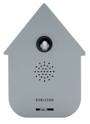 Graue moderne Soundbox in Form eines Hauses mit einem kleinen weißen Vogel in der Mitte, Vorderansicht