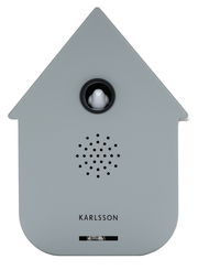 Graue moderne Soundbox in Form eines Hauses mit einem kleinen weißen Vogel in der Mitte, Vorderansicht