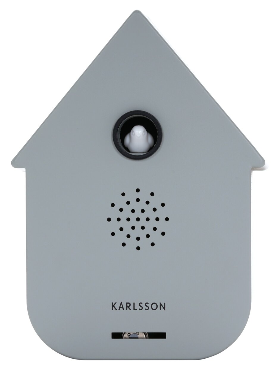 Grijze, moderne luidsprekerkast in de vorm van een huisje met een klein wit vogeltje in het midden, vooraanzicht