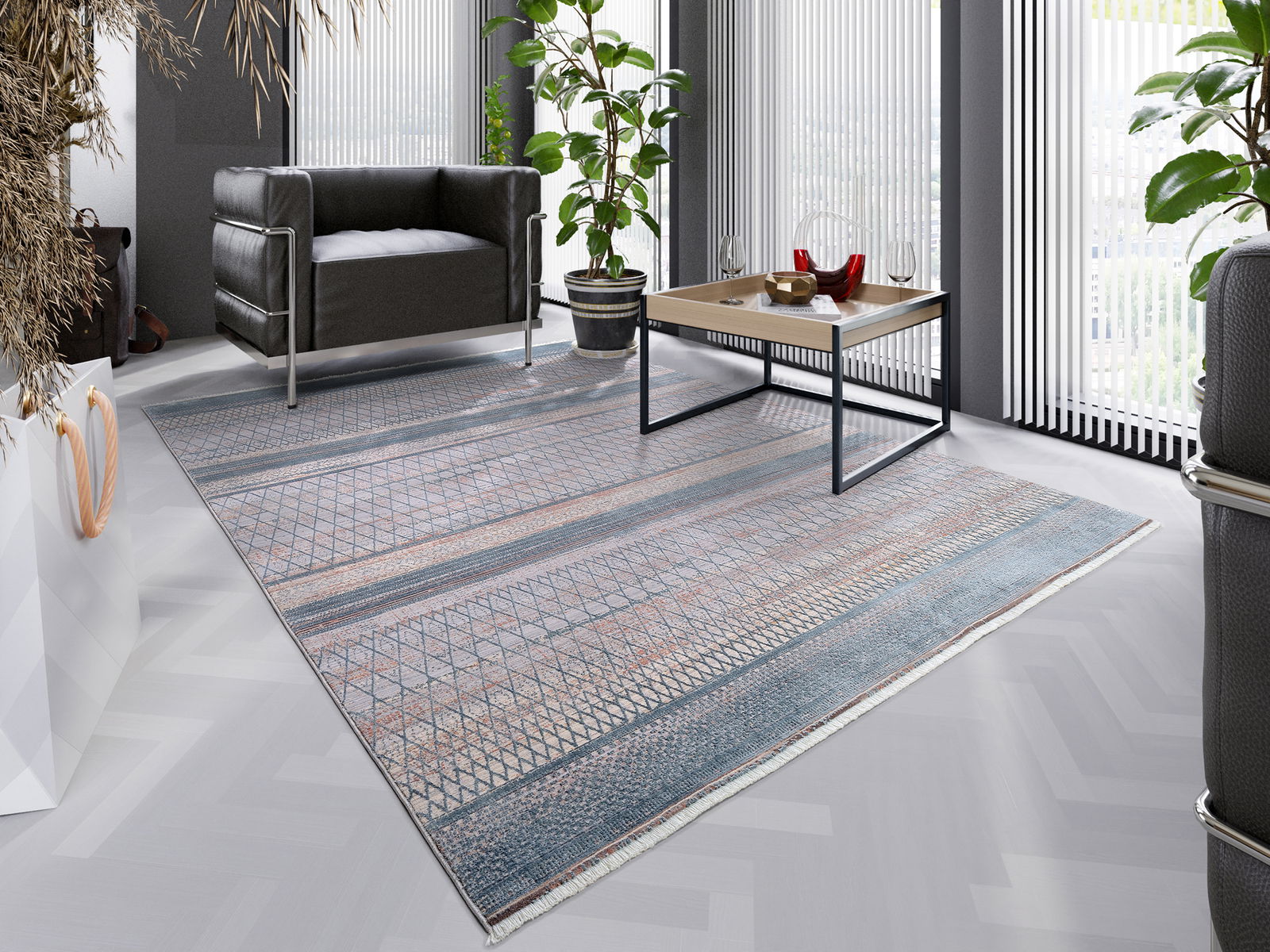 Designer Teppich in modernem Wohnzimmer, Perspektive von oben, mit grauem Sessel, Couchtisch und Pflanzen.