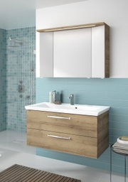 Moderner Badblock mit Holzoptik und weißem Waschbecken, frontal betrachtet, vor einer türkisfarbenen Fliesenwand.