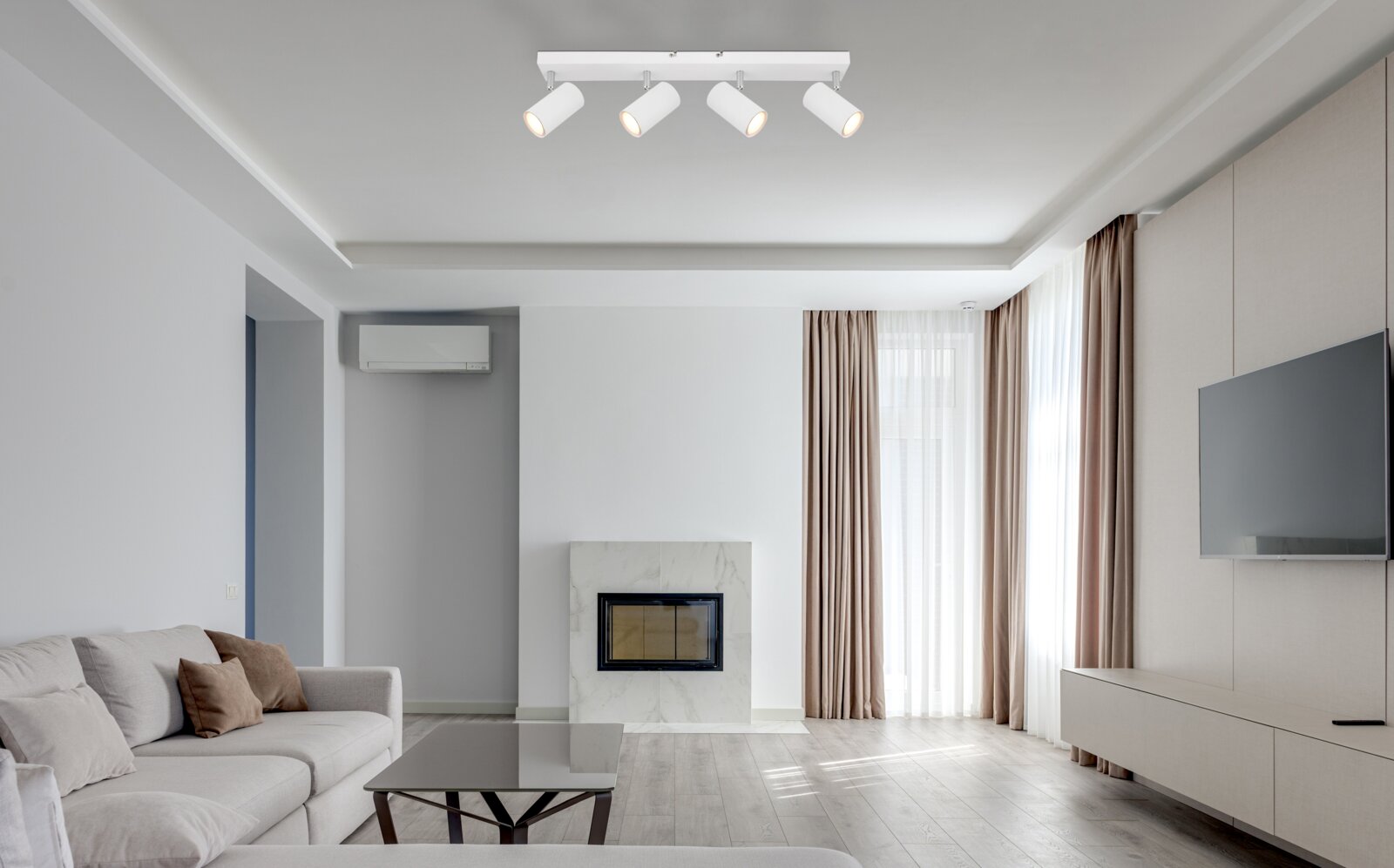 Globo Lighting Spot ROBBY Moderne witte plafondspot met vier verstelbare spots in een stijlvolle woonkamer, gezien van onderaf.
