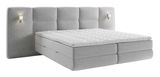 Graues Boxspringbett mit gepolstertem Kopfteil und integrierten Leuchten, seitliche Perspektive