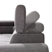 Graues Ecksofa mit verstellbarer Kopfstütze, Seitenansicht