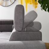 Graues Ecksofa mit verstellbarer Kopfstütze, Seitenansicht