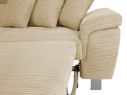 Nahaufnahme einer beige gestreiften Rundecke mit Kissen, seitliche Perspektive