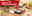Mediterraner Tisch mit Wein, Baguette, Dips, Oliven, Tomaten und gratis Paketlieferung Hinweis