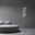 Moderne LED-Stehleuchte PURE POPOUT mit mehreren kugelförmigen Leuchten, seitliche Perspektive neben einem runden Sofa in einem minimalistischen Raum.