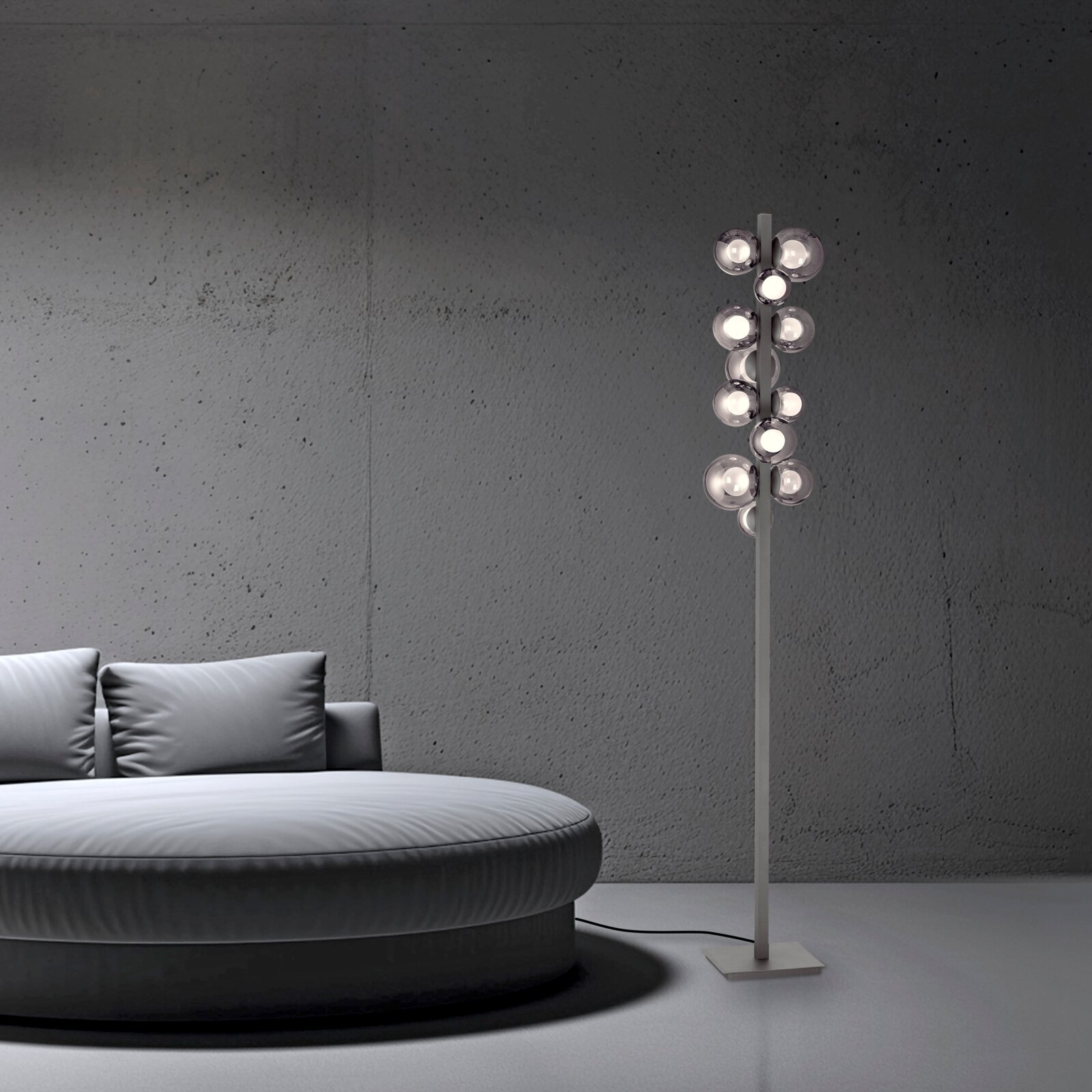 Neuhaus Pure LED-staande lamp PURE POPUP Moderne LED-staande lamp PURE POPOUT met meerdere bolvormige lampen, zijaanzicht naast een ronde bank in een minimalistische ruimte.