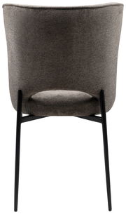 Rückansicht eines modernen, gepolsterten Stuhls mit schwarzem Metallgestell.