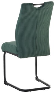 Rückansicht eines grünen Schwingstuhls mit geripptem Stoffbezug und schwarzem Metallgestell.