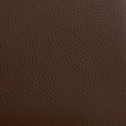 Close-up van een bruine leerstructuur, gebruikt voor een fauteuil.