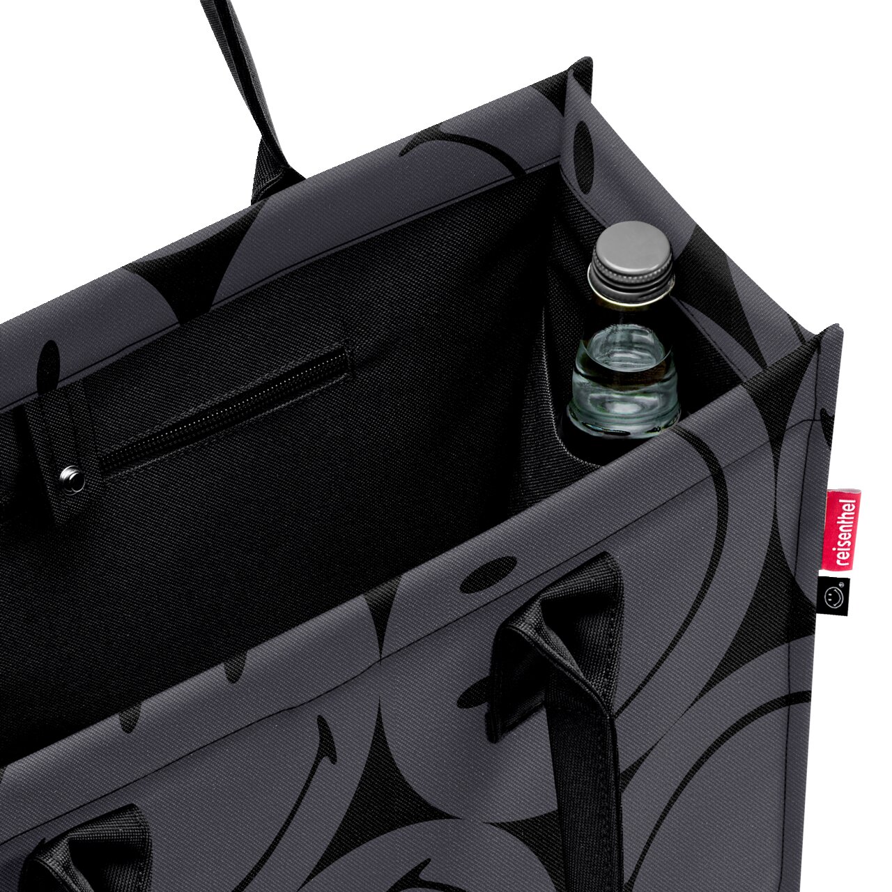 Graue Einkaufstasche mit schwarzem Muster, Innenansicht mit Flaschenhalter und Reißverschlusstasche, von oben betrachtet.